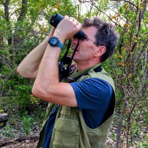 Matt birding with binoculars